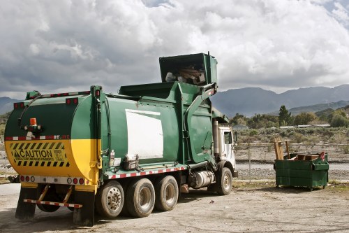 Eco-friendly waste disposal practices by Hanwell's top muck away services.
